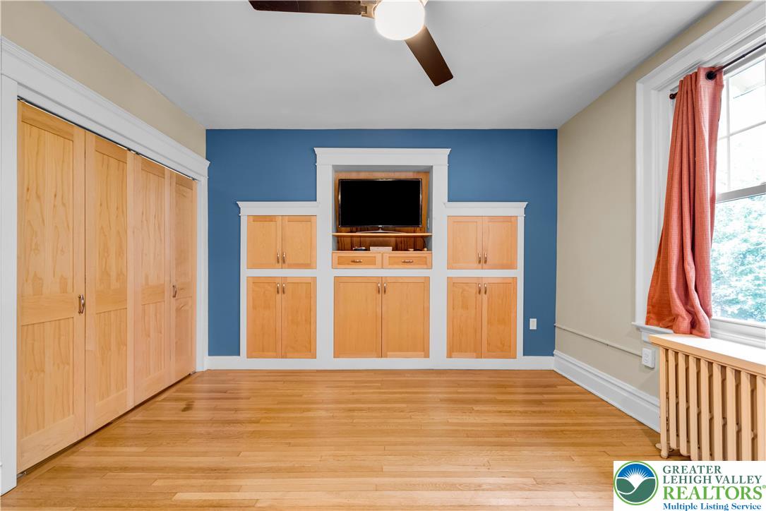 1722 Maple Street Bethlehem, PA 18017 - Photo 19 of 30 a view of an empty room with wooden floor and a window