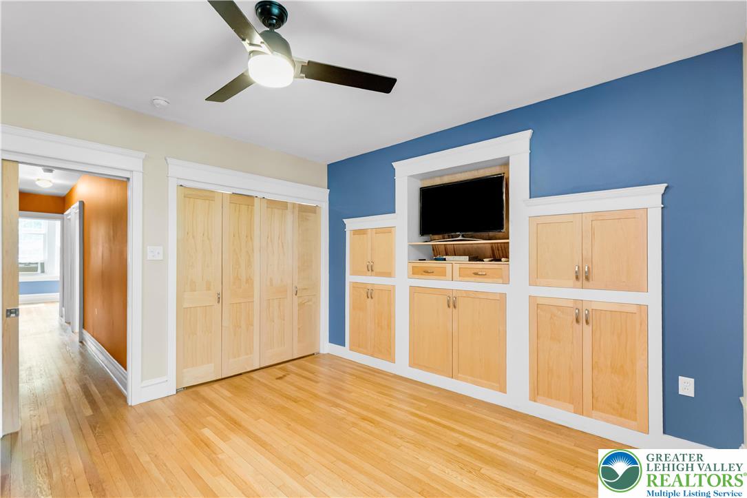 1722 Maple Street Bethlehem, PA 18017 - Photo 20 of 30 a view of room with wooden floor and windows