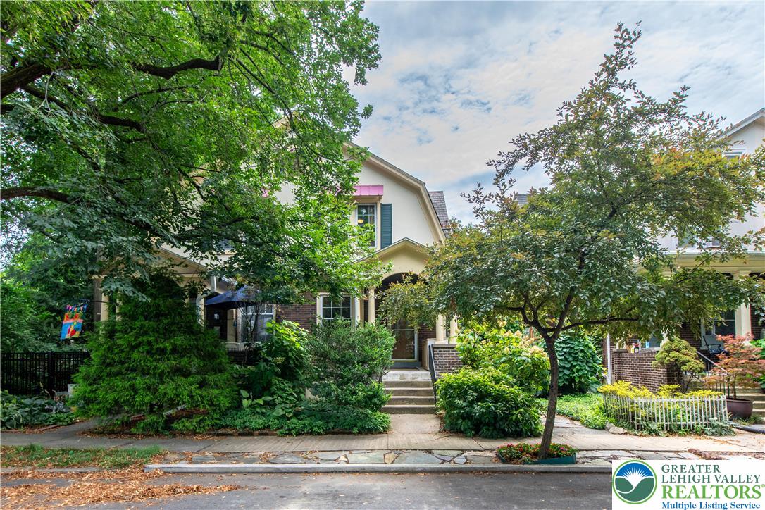 1722 Maple Street Bethlehem, PA 18017 - Photo 2 of 30 a front view of a house with plants and trees