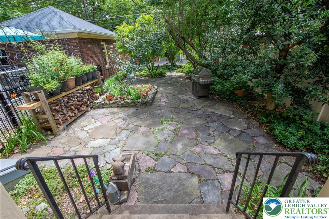 1722 Maple Street Bethlehem, PA 18017 - Photo 23 of 30 a view of a backyard with plants and a garden