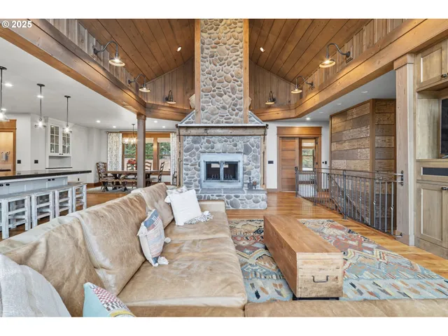 a bedroom with a large bed and a large window