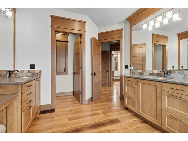 a view of living room kitchen and entryway