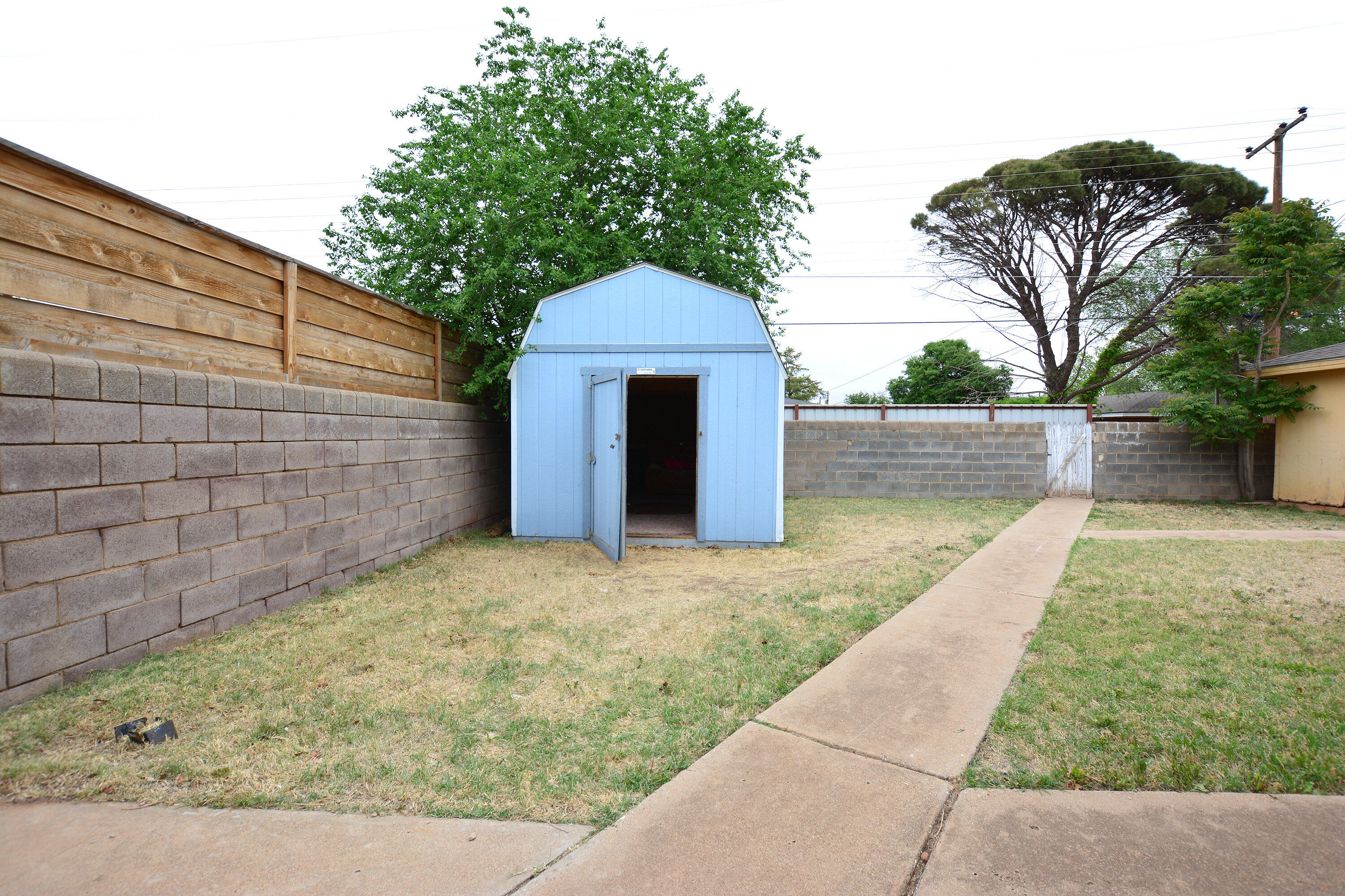 5224 9th Street Lubbock, TX 79416 - Photo 22 of 26 a view of back yard of the house