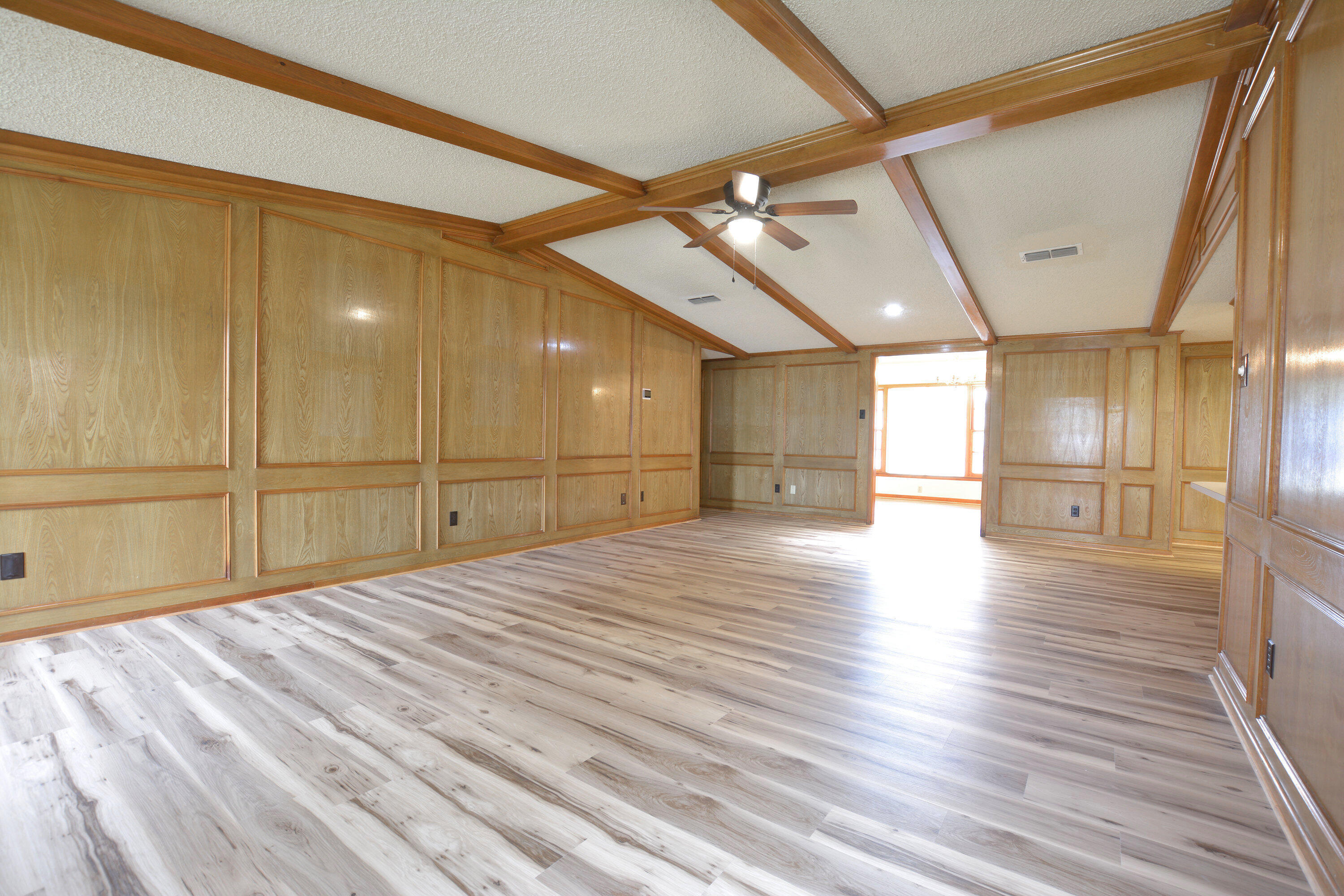 5224 9th Street Lubbock, TX 79416 - Photo 9 of 26 a view of empty room with wooden floor