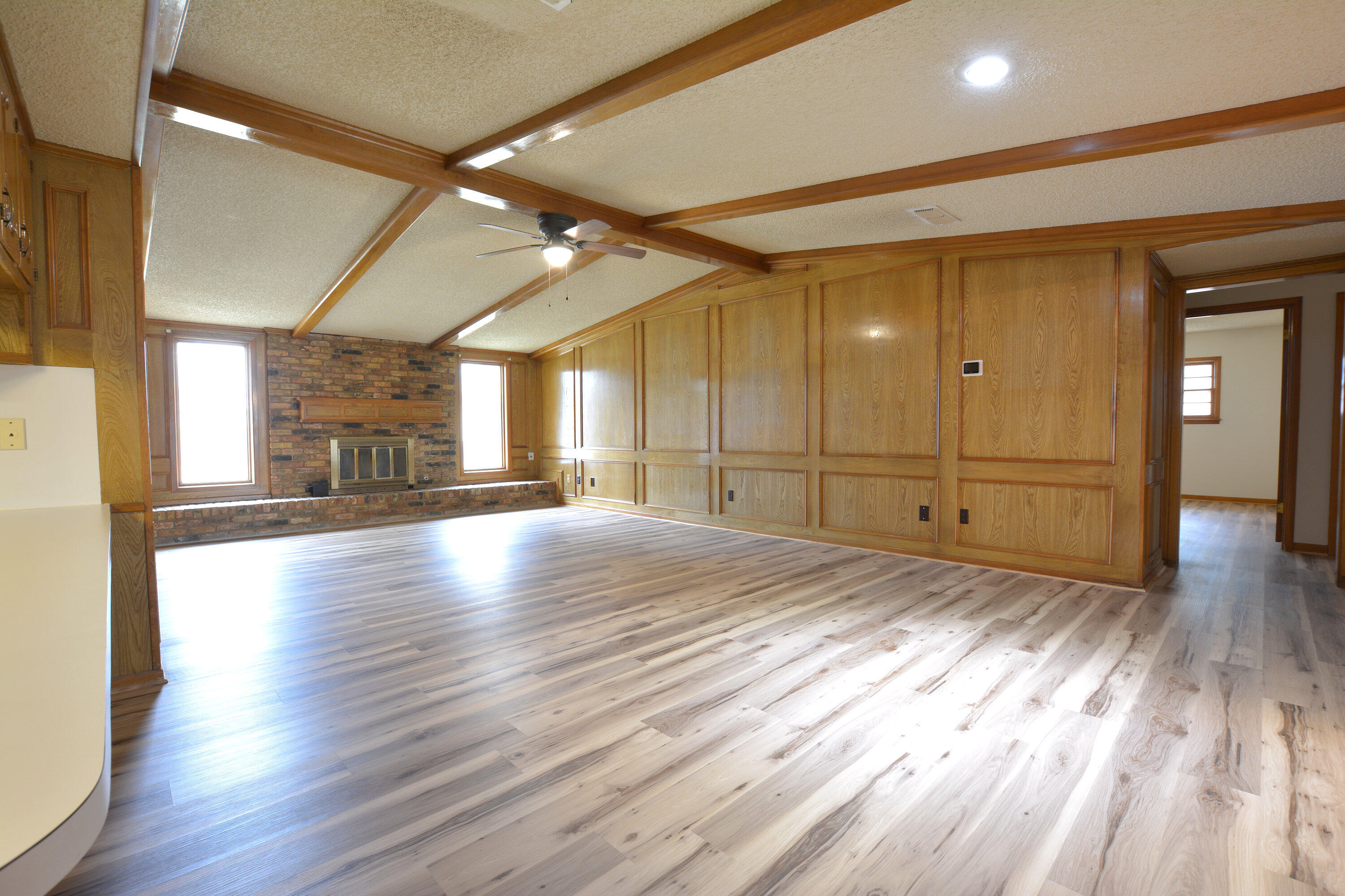 5224 9th Street Lubbock, TX 79416 - Photo 10 of 26 a view of a room window and wooden floor