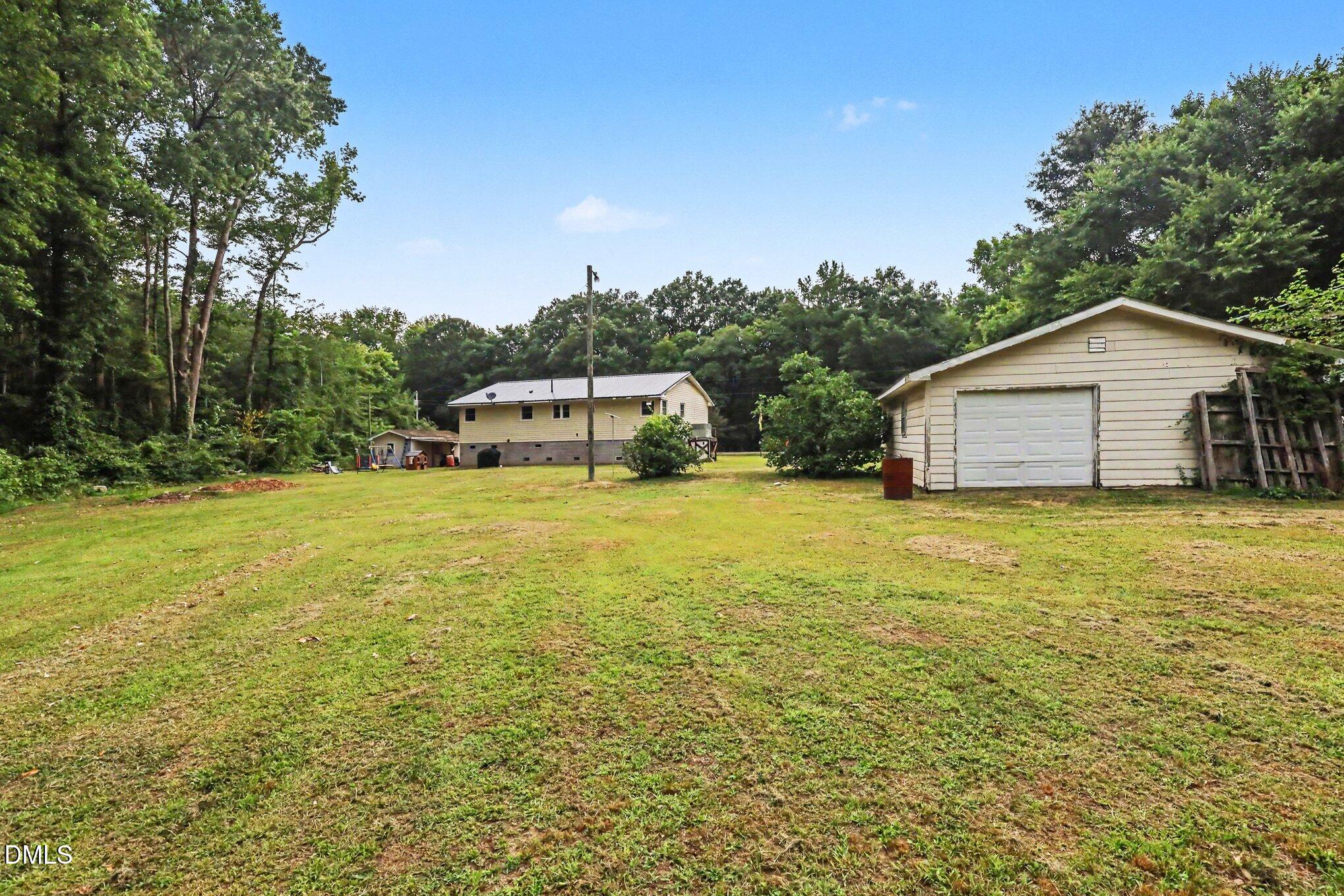 977 Stevens Mill Road Goldsboro, NC 27530 - Photo 29 of 31 a house view with a outdoor space