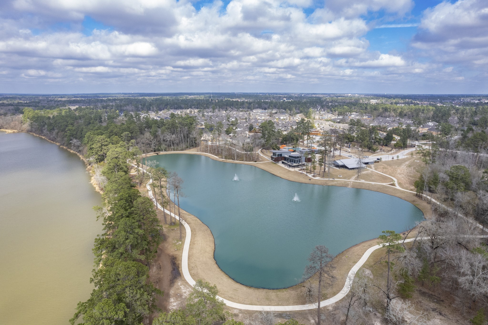 527 Chestnut Reef Court Conroe, TX 77304 - Photo 39 of 40 a view of a lake from a balcony