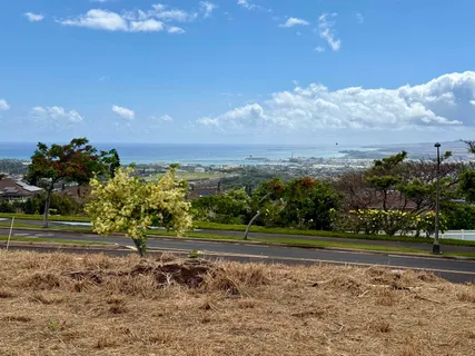 a view of a golf course with a lake