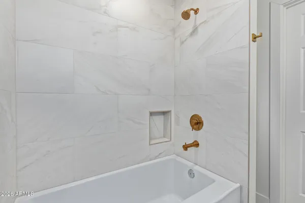 a bathroom with a bathtub