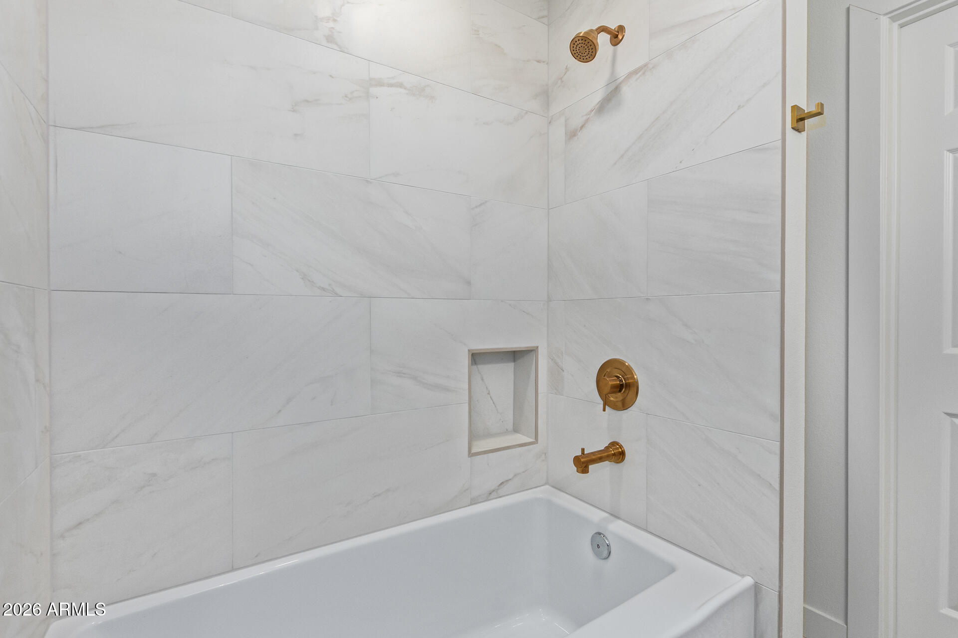 2111 South River Drive Tempe, AZ 85282 - Photo 14 of 26 a bathroom with a bathtub