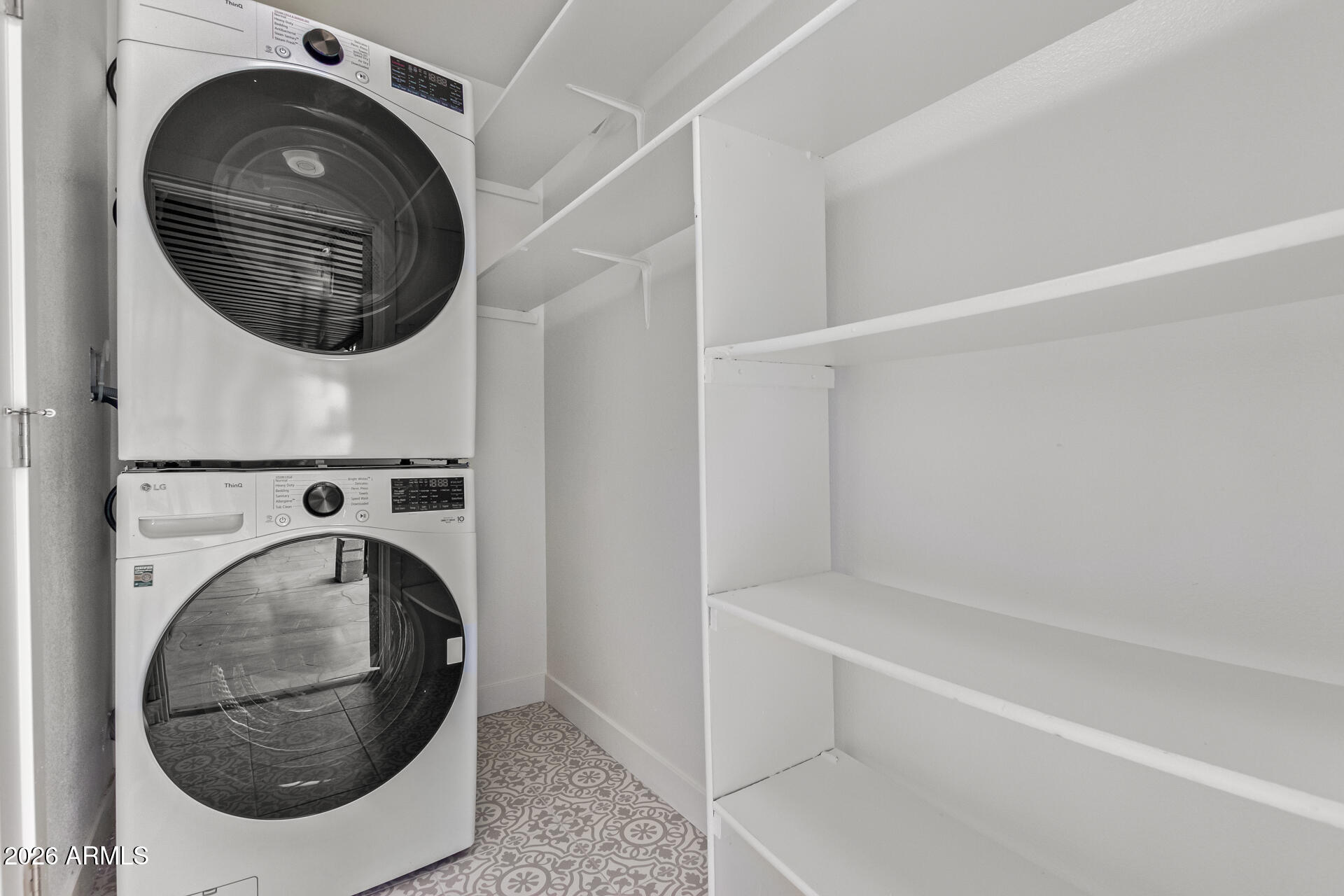 2111 South River Drive Tempe, AZ 85282 - Photo 20 of 26 a bathroom with a sink and a mirror