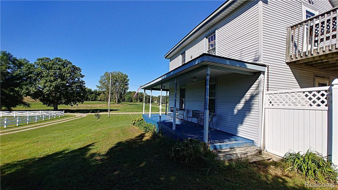 16075 Arnold Road Gregory, MI 48137 - Photo 31 of 54 Covered porch on South side of home looking to South Paddock.jpg