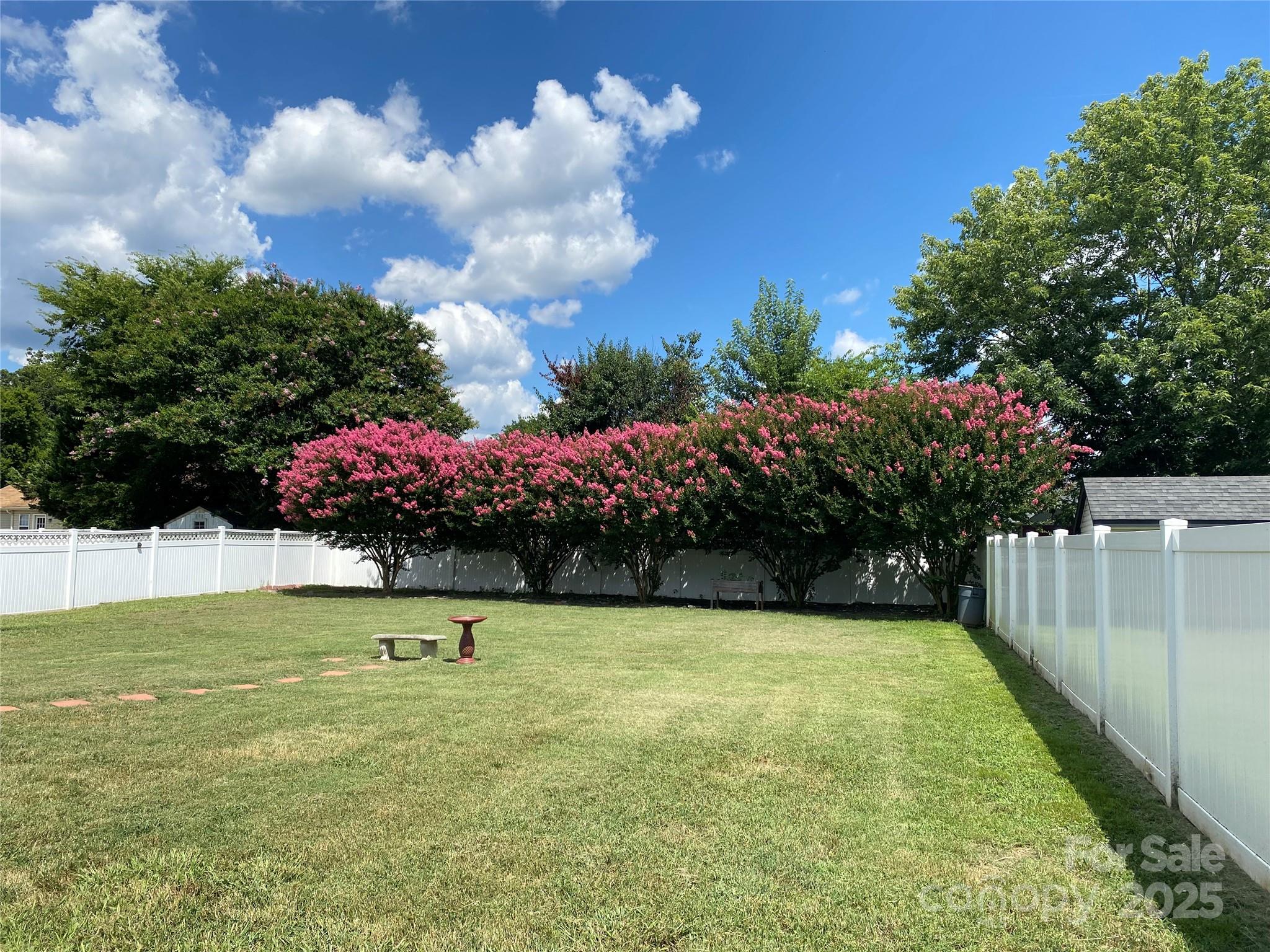 4562 Lanstone Court Southwest Concord, NC 28027 - Photo 27 of 30 a view of an outdoor space and swimming pool