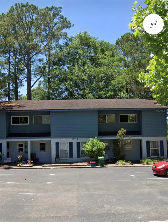 front view of a house with a street