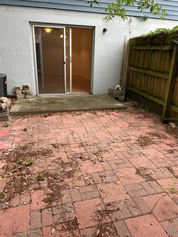 a view of backyard with cabin