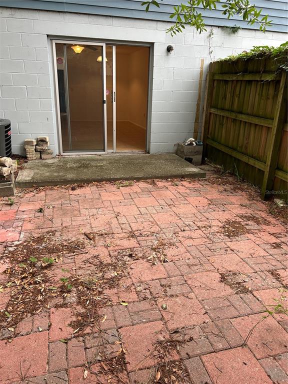 3936 Southwest 26th Terrace, Unit B Gainesville, FL 32608 - Photo 14 of 15 a view of backyard with cabin