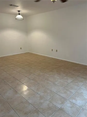 a view of a room with an empty space