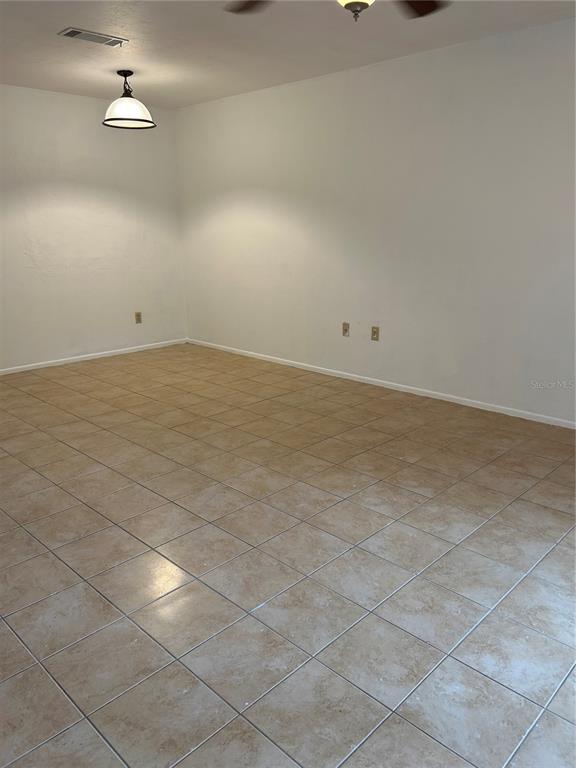 3936 Southwest 26th Terrace, Unit B Gainesville, FL 32608 - Photo 3 of 15 a view of a room with an empty space