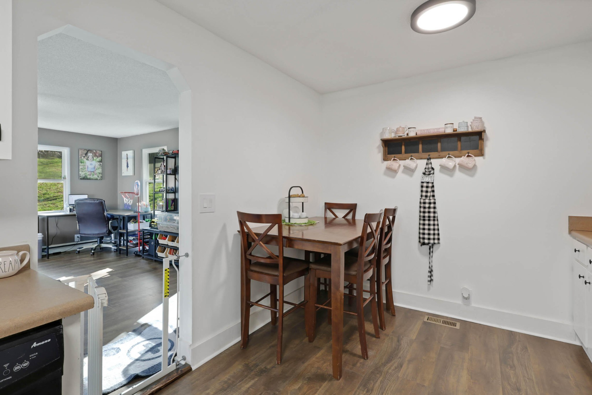 1881 Three Notch Road Ringgold, GA 30736 - Photo 11 of 27 a view of a workspace with furniture and wooden floor