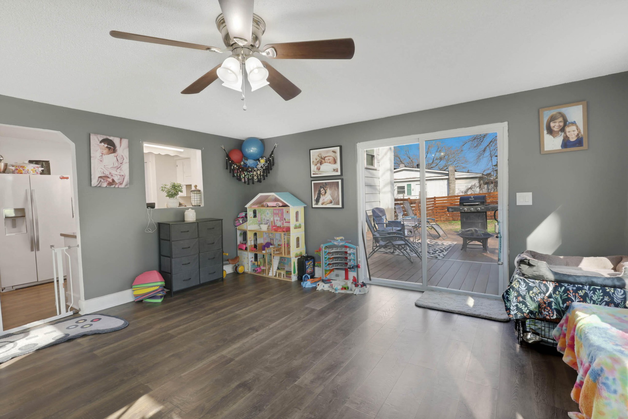 1881 Three Notch Road Ringgold, GA 30736 - Photo 13 of 27 a view of a livingroom with furniture hardwood floor and a ceiling fan