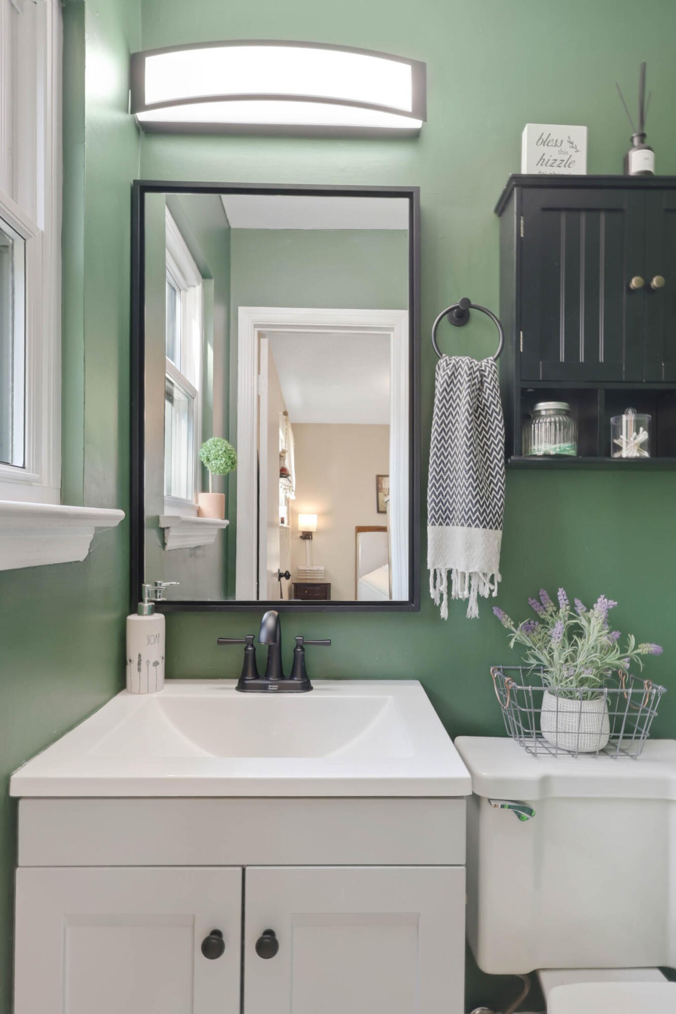 1881 Three Notch Road Ringgold, GA 30736 - Photo 16 of 27 a bathroom with a sink and a mirror
