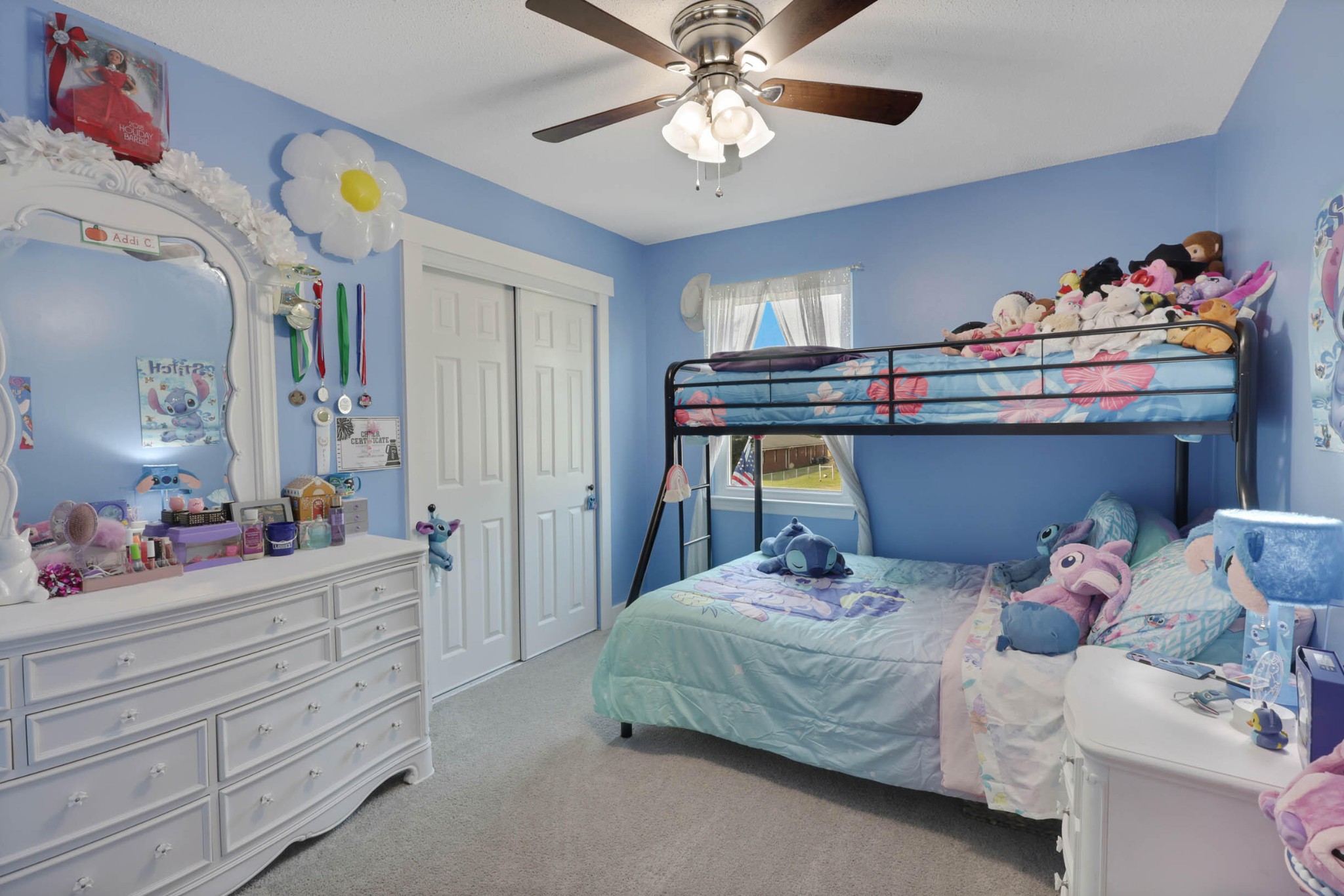 1881 Three Notch Road Ringgold, GA 30736 - Photo 17 of 27 a bedroom with a bed and a chandelier