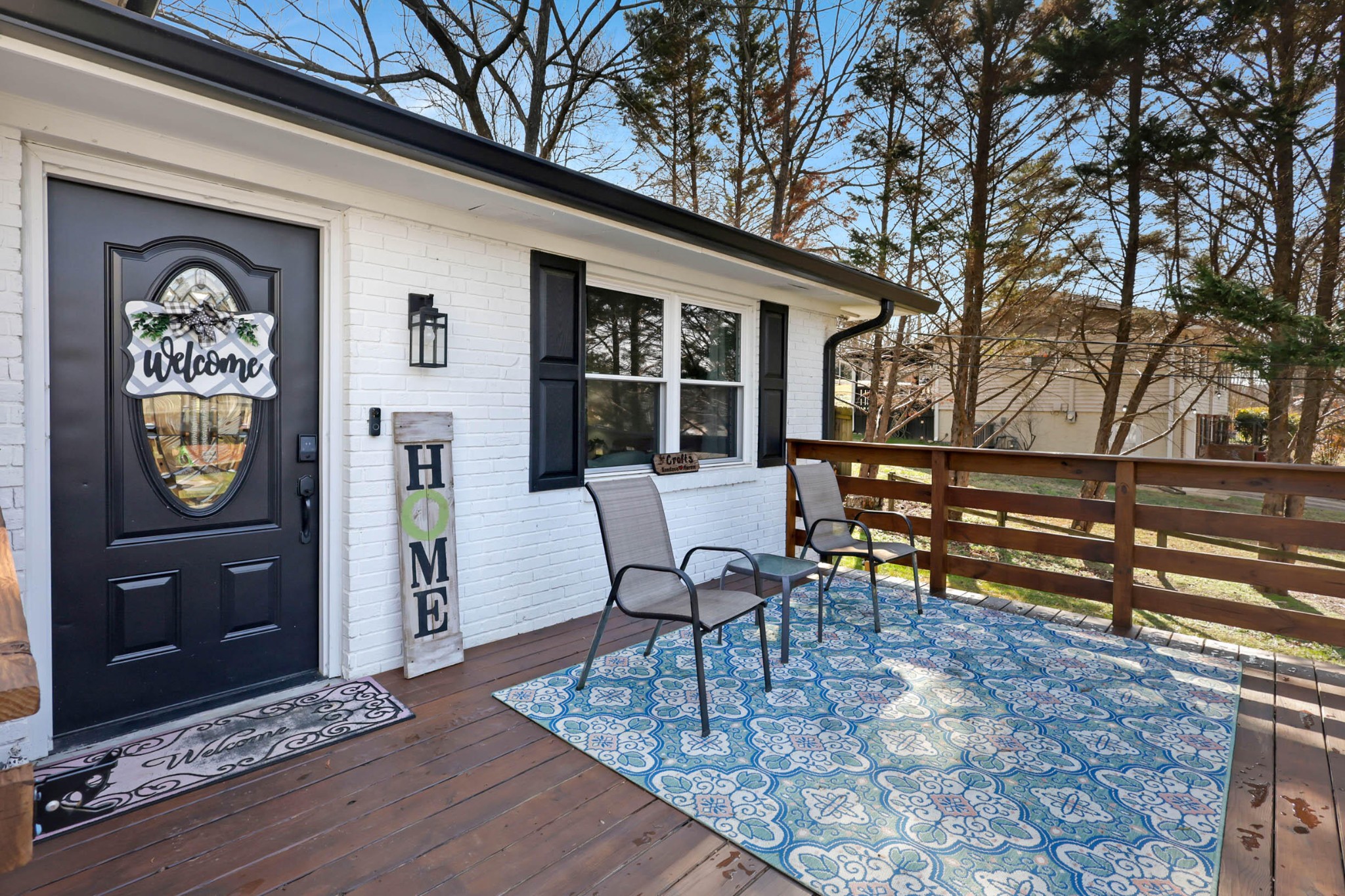 1881 Three Notch Road Ringgold, GA 30736 - Photo 5 of 27 a roof deck with a table and chairs