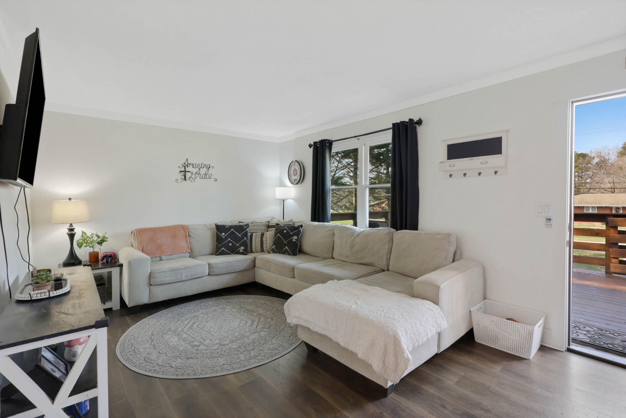 1881 Three Notch Road Ringgold, GA 30736 - Photo 6 of 27 a living room with furniture and a flat screen tv