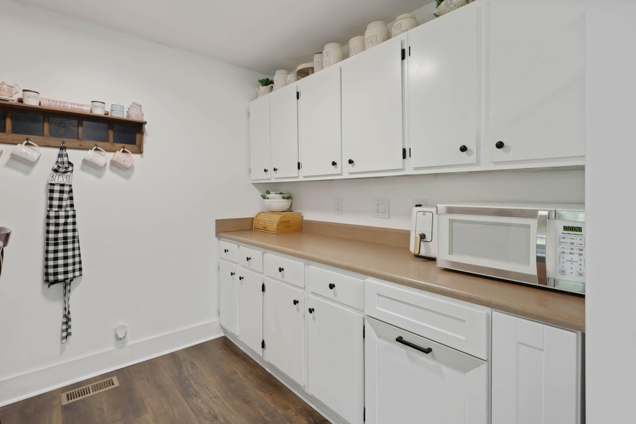 1881 Three Notch Road Ringgold, GA 30736 - Photo 10 of 27 a kitchen with white cabinets and sink