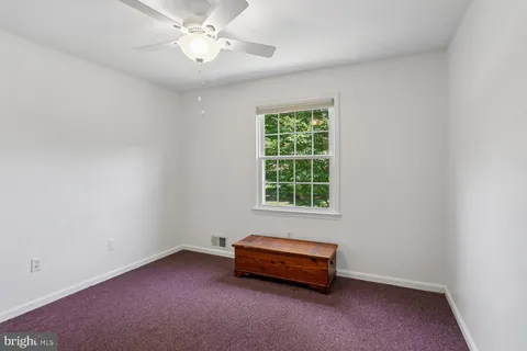 a view of house with yard