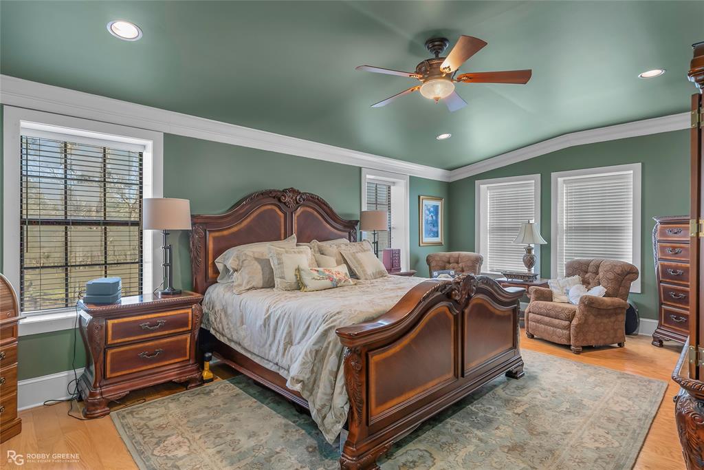 6340 Pine Hill Road Shreveport, LA 71107 - Photo 27 of 40 Bedroom featuring crown molding, light wood-style flooring, recessed lighting, ceiling fan, and vaulted ceiling