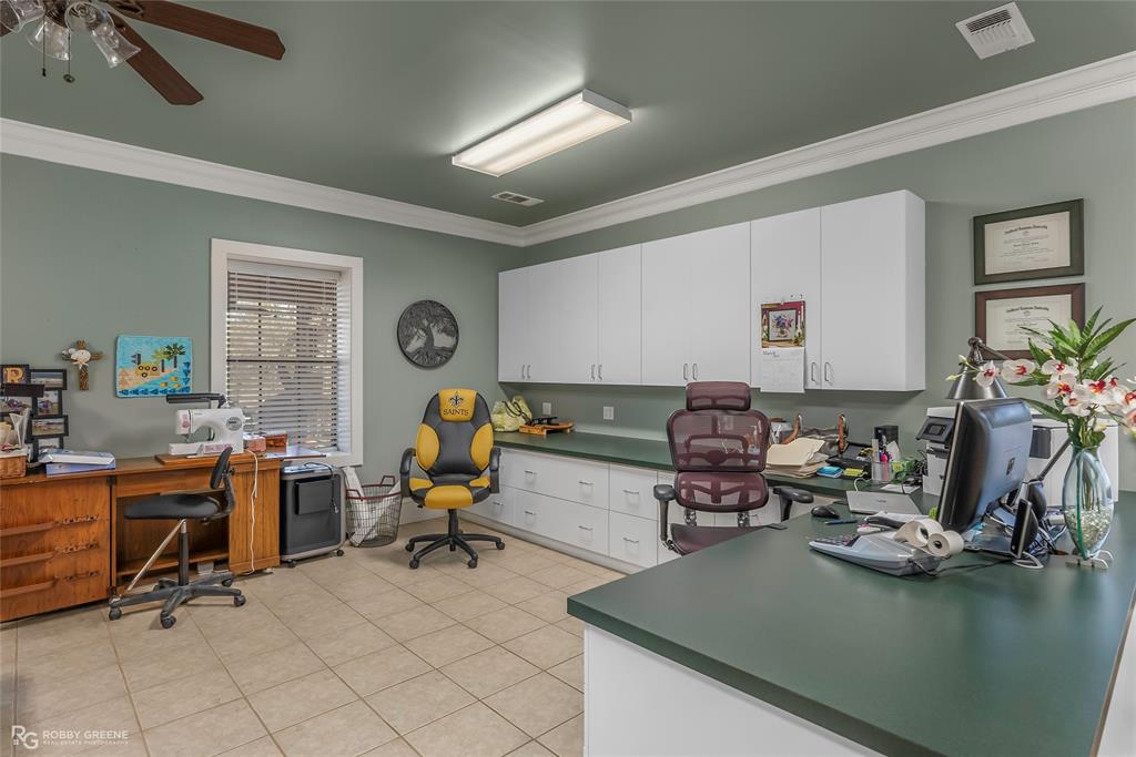 6340 Pine Hill Road Shreveport, LA 71107 - Photo 31 of 40 Office space featuring ornamental molding, ceiling fan, light tile patterned floors, and built in desk