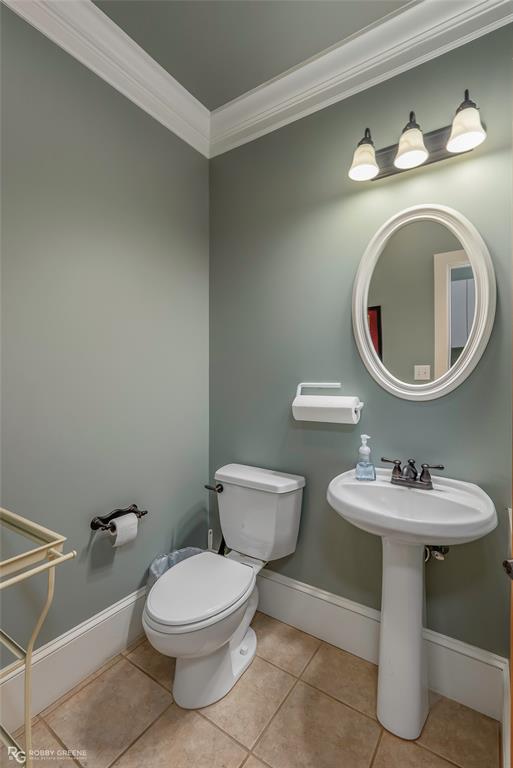 6340 Pine Hill Road Shreveport, LA 71107 - Photo 32 of 40 Bathroom with crown molding and light tile patterned flooring