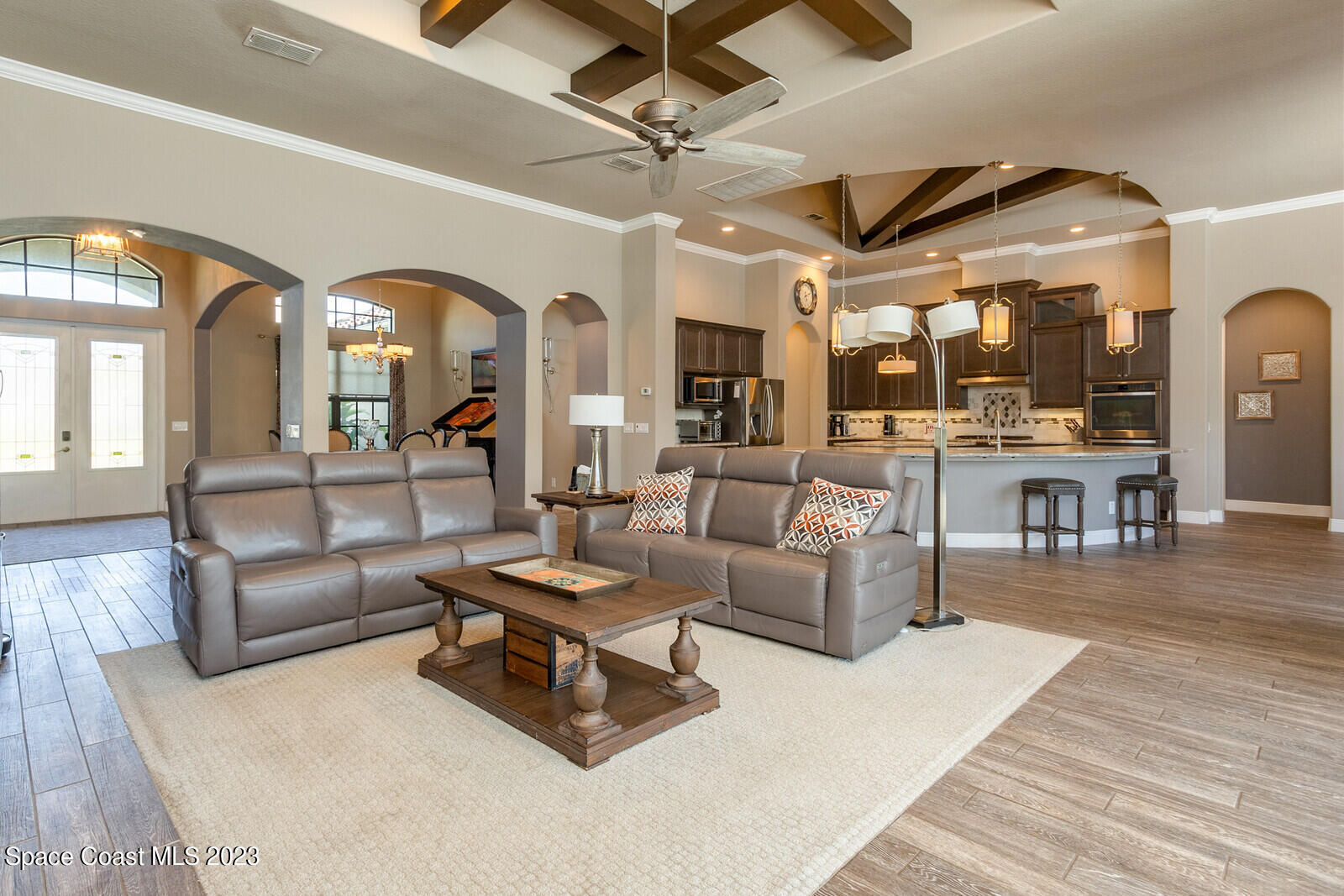 5107 Kirkwall Circle Melbourne, FL 32940 - Photo 20 of 44 a living room with furniture and a large window