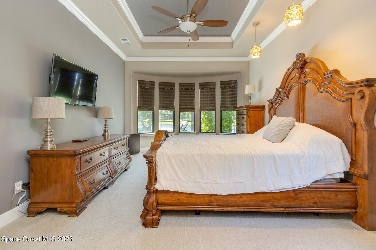 5107 Kirkwall Circle Melbourne, FL 32940 - Photo 29 of 44 a bedroom with a bed and a window