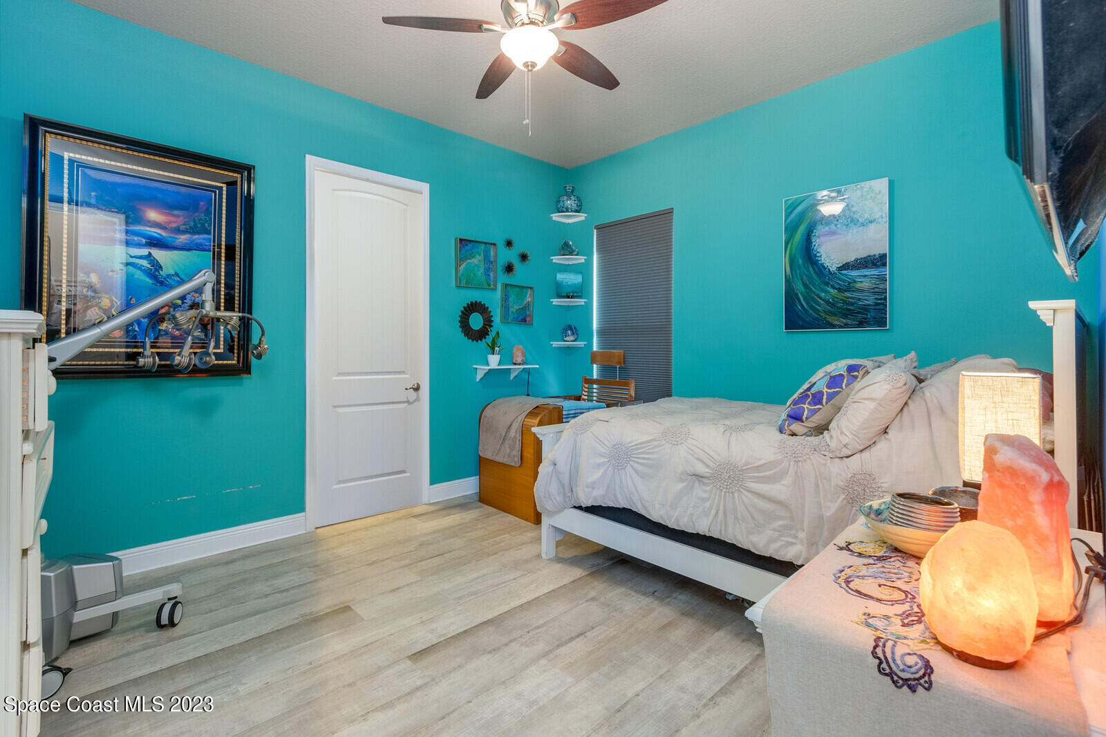 5107 Kirkwall Circle Melbourne, FL 32940 - Photo 34 of 44 a bedroom with a bed and window