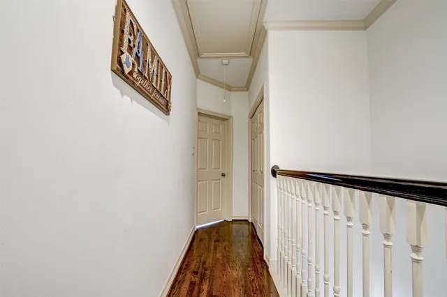 a view of a hallway with a stairs