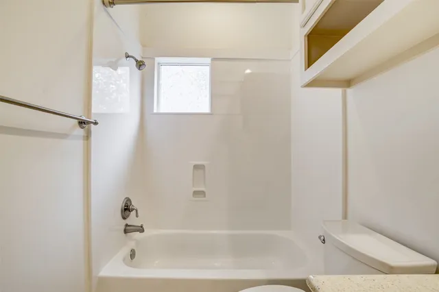 a bathroom with a bathtub
