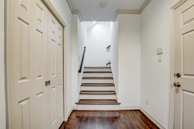 a view of entryway with wooden floor
