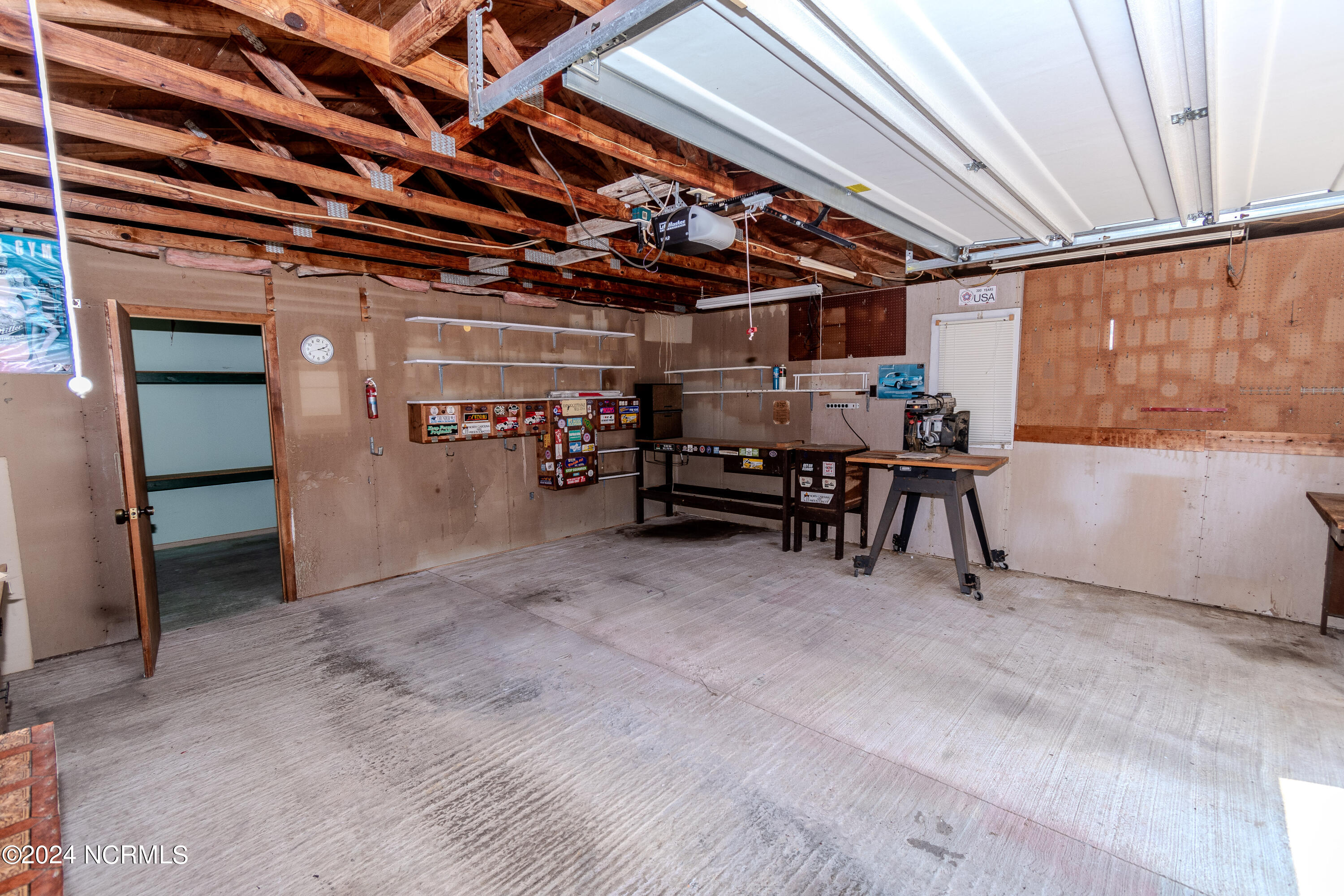 115 Youpon Drive Hubert, NC 28539 - Photo 72 of 76 1 car garage with workshop