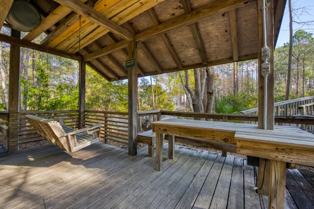 a view of a chairs and table in the patio