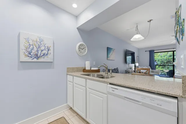 a view of vanity a sink and a window