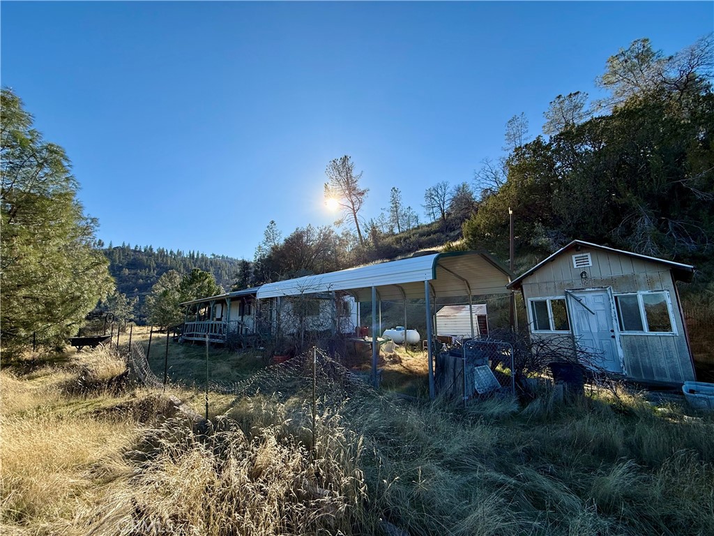 5847 West Whitlock Road Mariposa, CA 95338 - Photo 17 of 33 a view of a house with a yard
