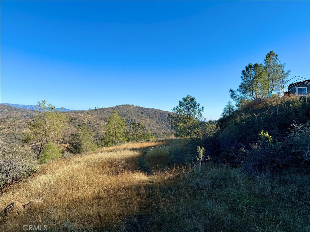 5847 West Whitlock Road Mariposa, CA 95338 - Photo 23 of 33 a view of lake with mountain