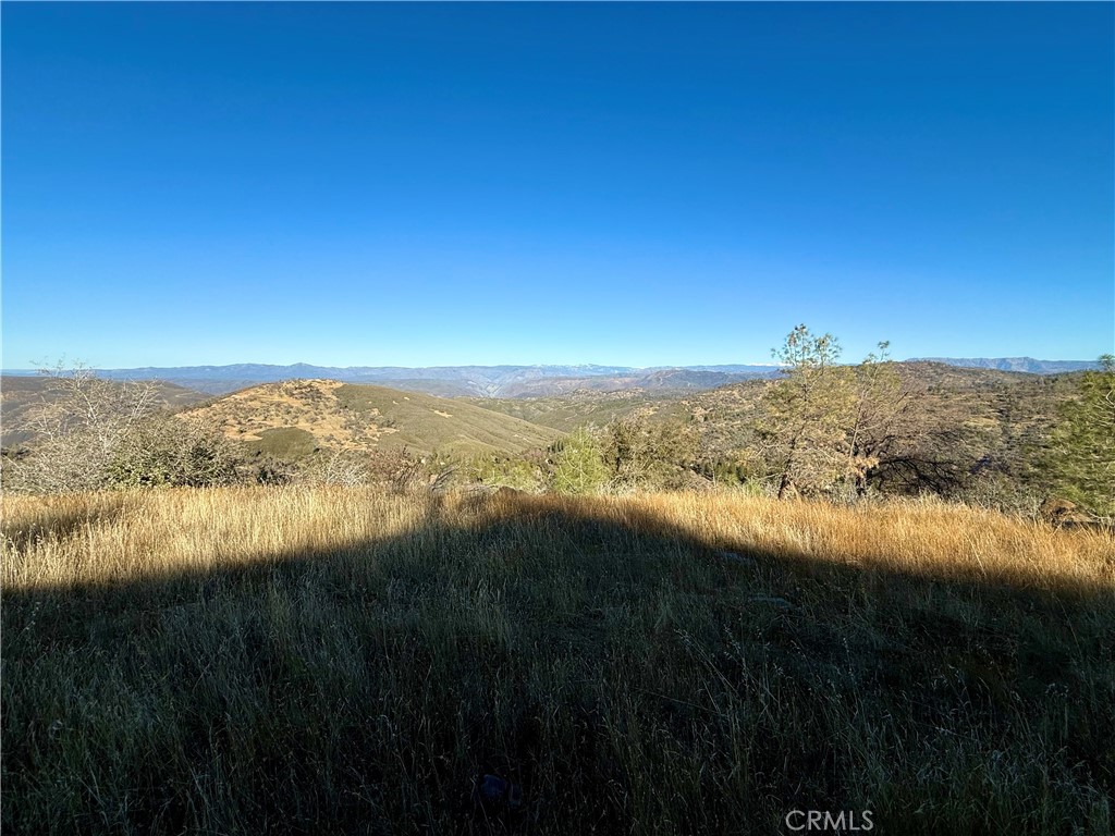 5847 West Whitlock Road Mariposa, CA 95338 - Photo 24 of 33 a view of lake with mountain