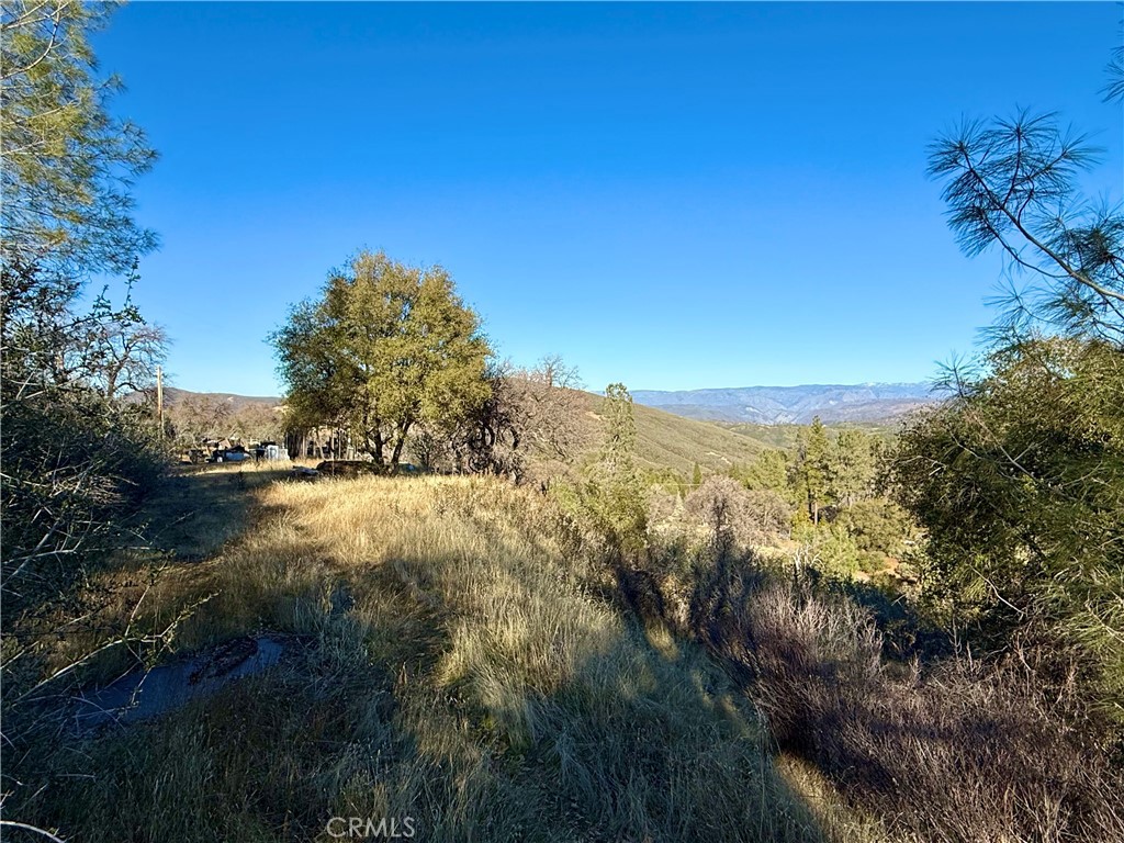 5847 West Whitlock Road Mariposa, CA 95338 - Photo 6 of 33 a view of lake view and mountain view