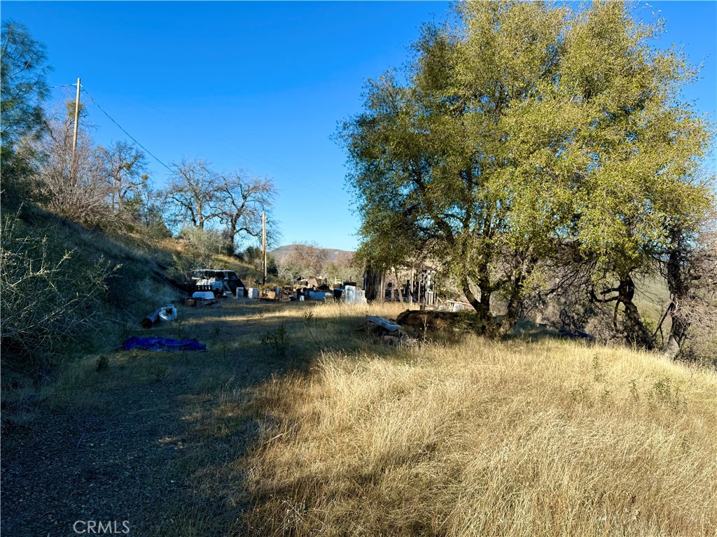 5847 West Whitlock Road Mariposa, CA 95338 - Photo 7 of 33 a view of a lake with houses