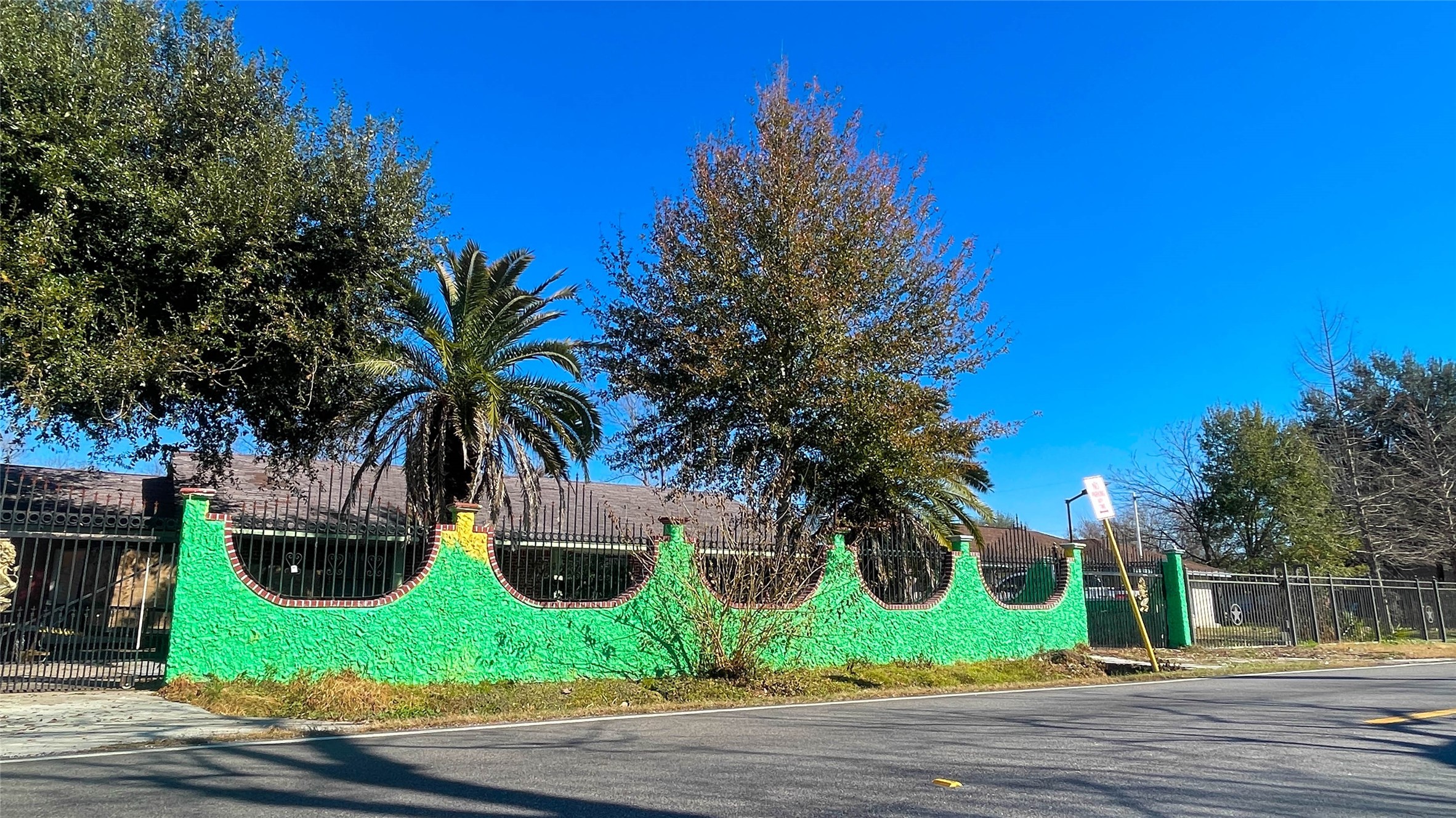 front view of a house with a garden