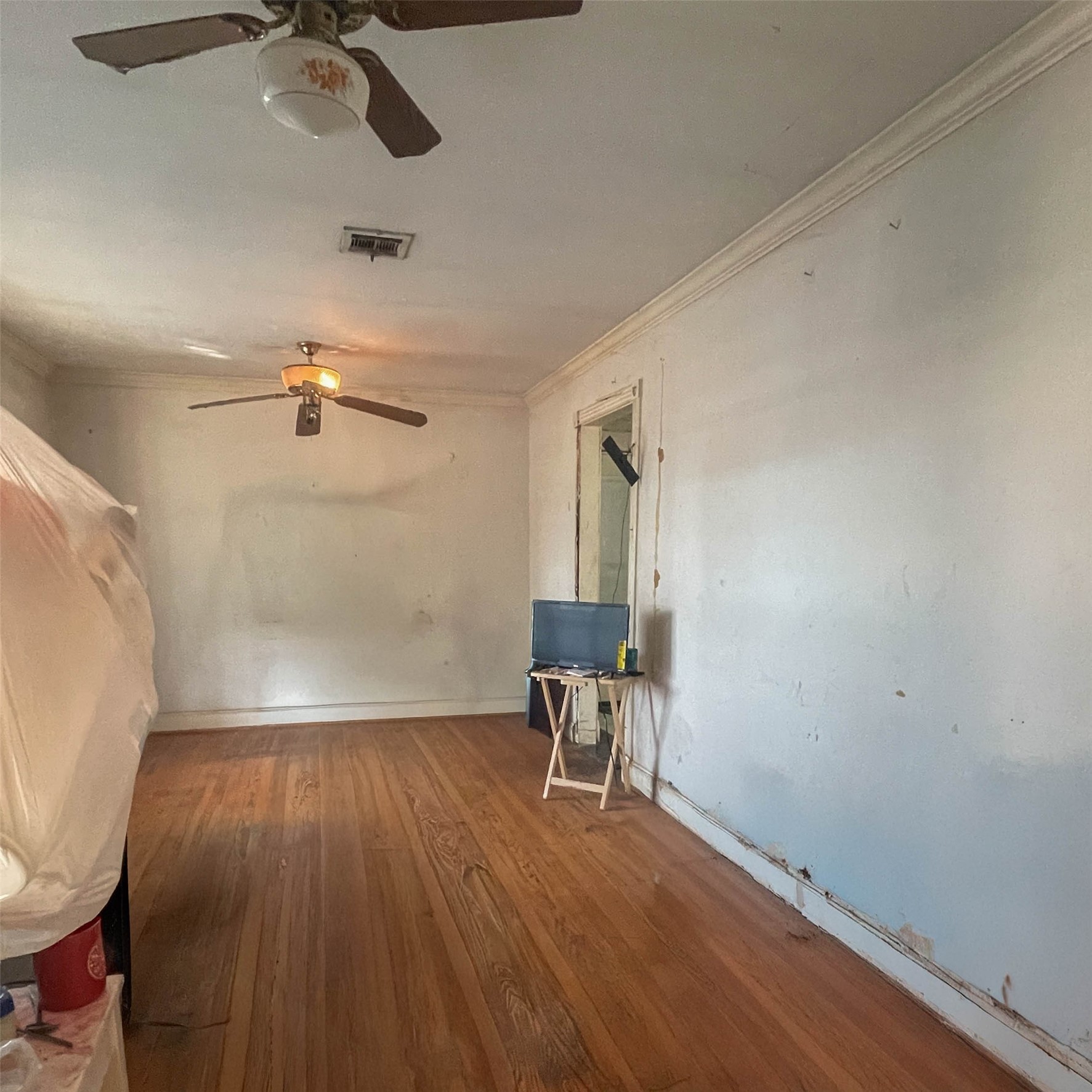 255 McFarland Road Houston, TX 77060 - Photo 7 of 28 a view of a room with wooden floor lounge chair and windows