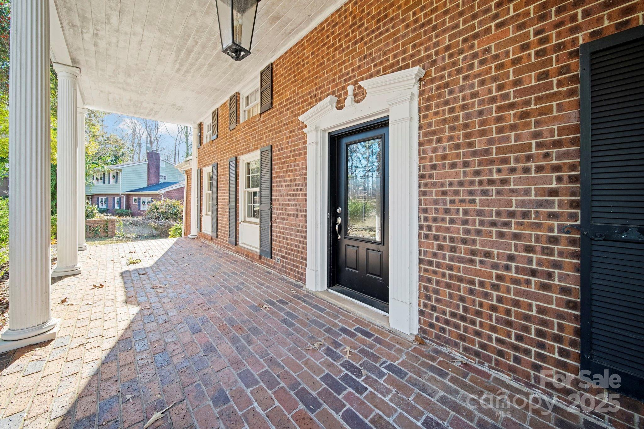415 Love Lane Rockingham, NC 28379 - Photo 44 of 46 a view of a brick house with a outdoor space